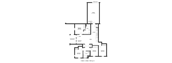 A floor plan of a house with a garage door and a bathroom.