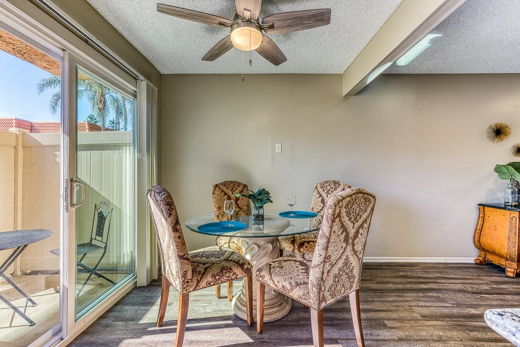 A patio with a table and chairs is shown.