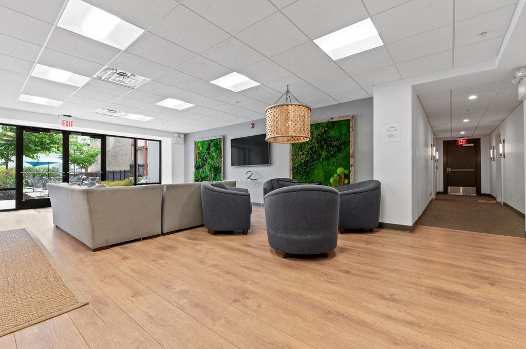 Student lounge with cozy chairs and plenty of open space