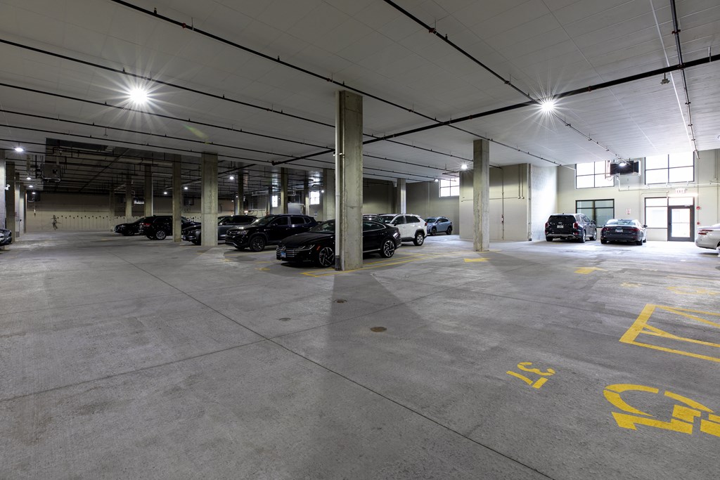 a parking garage with cars parked in it