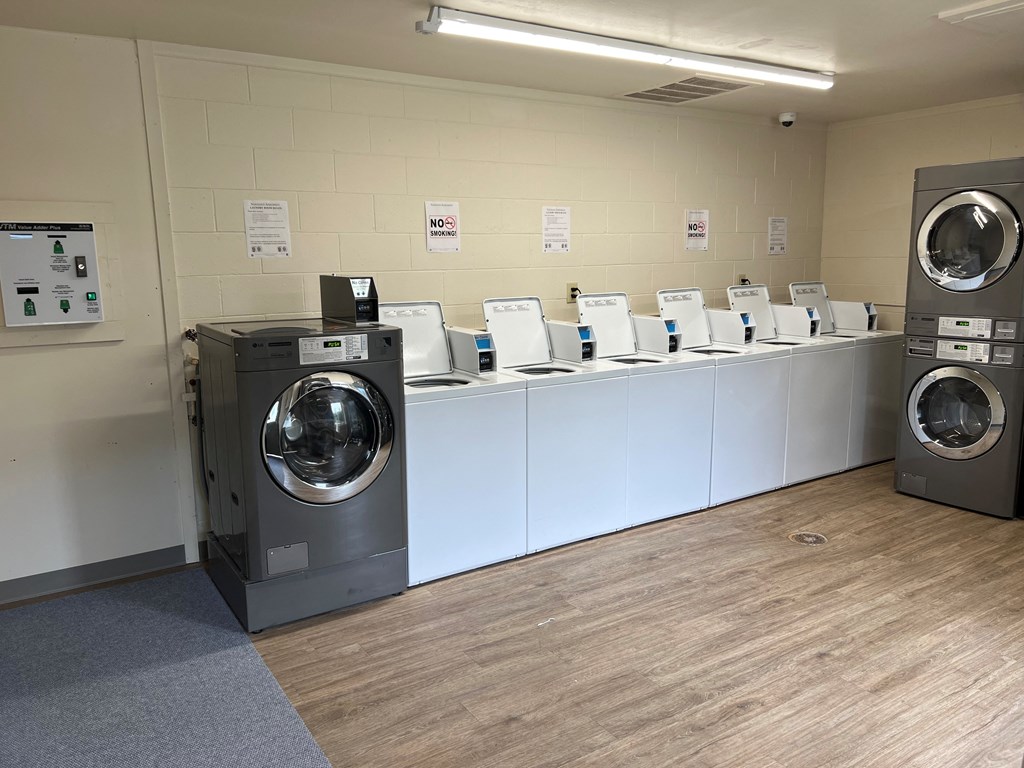 a washer and dryer area in a laundry room