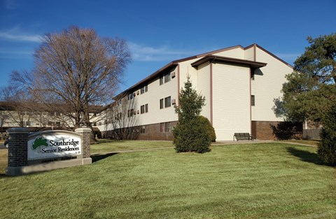 A building with a sign that says Southridge Senior Residents in front of it.