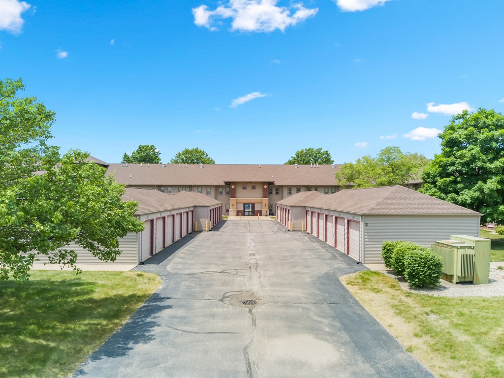 a building with a long driveway in front of it
