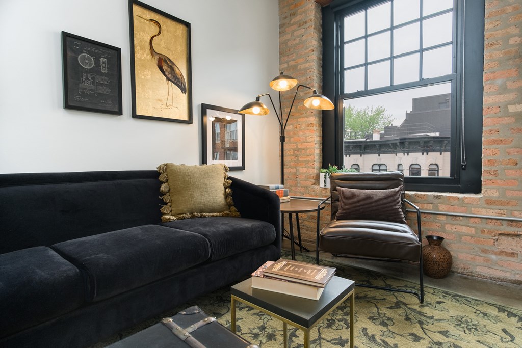 The Duncan beautiful living room furniture with exposed brick wall