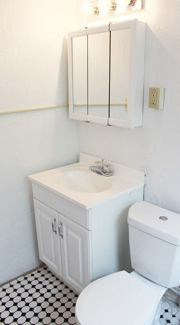 a small bathroom with a toilet and a sink