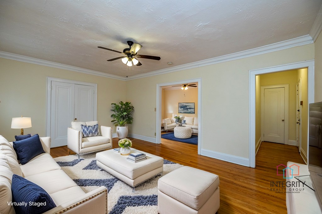 An example of a furnished living room at The Heights Collection.