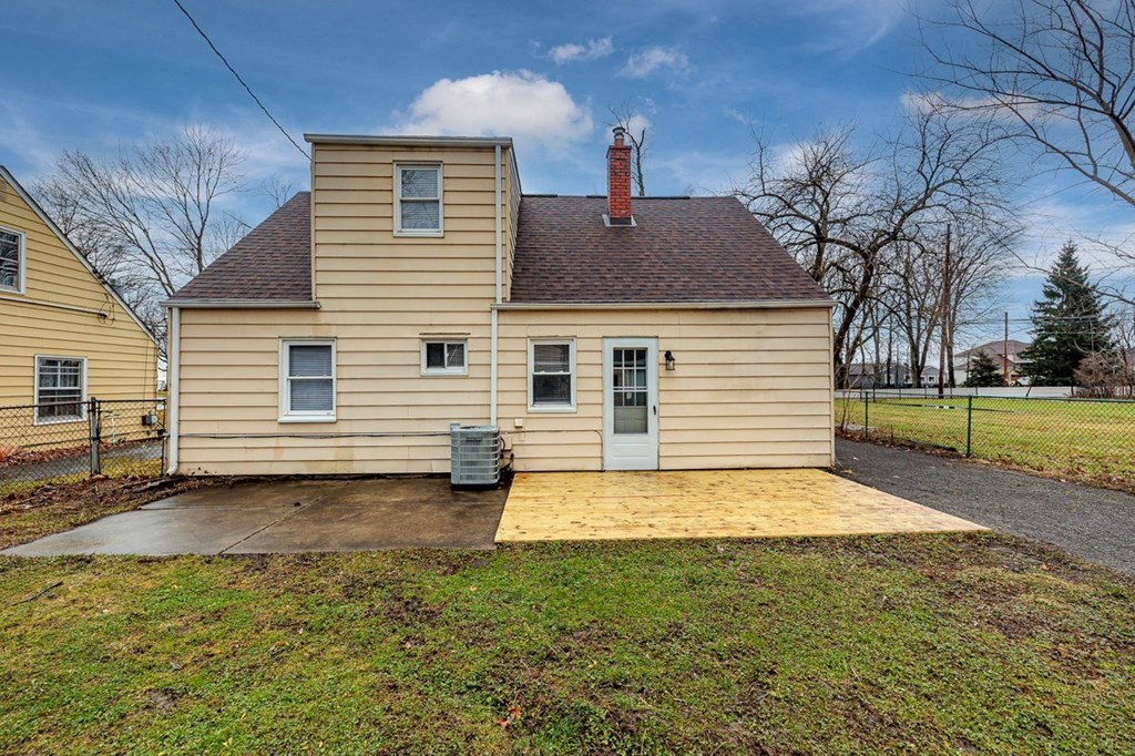 Backyard featuring new plank patio.