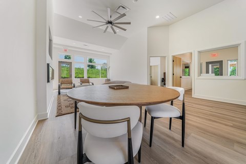 A dining room with a round table and chairsat Renova of Brunswick Apartments, Brunswick, OH, 44212