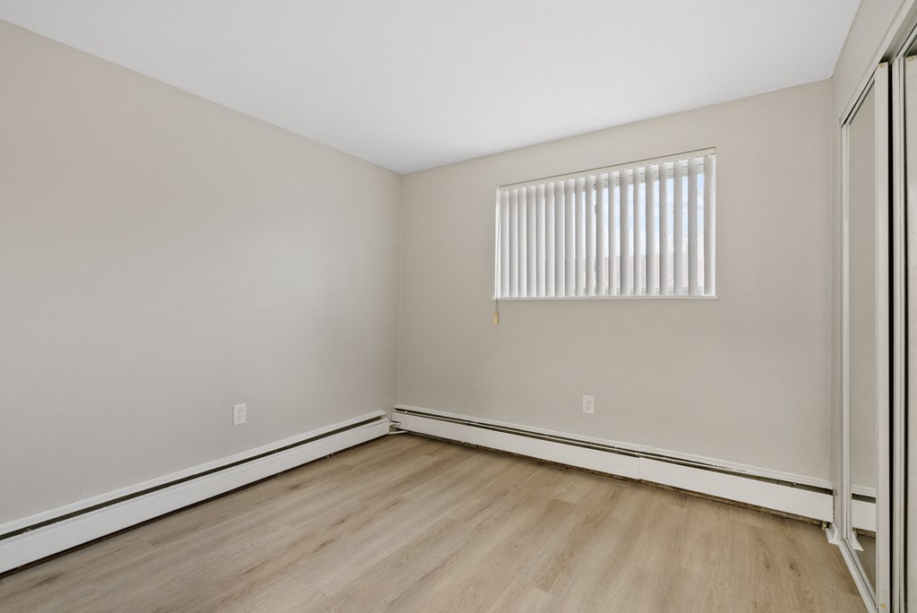 Bedroom with a high window.