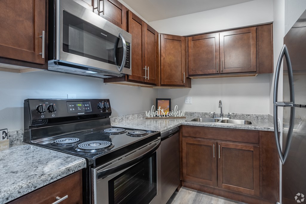 Dark finish upgraded kitchen at Eagles Landing Apartments, Integrity Realty, Kent, 44240