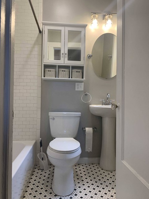 a small bathroom with a toilet and a sink