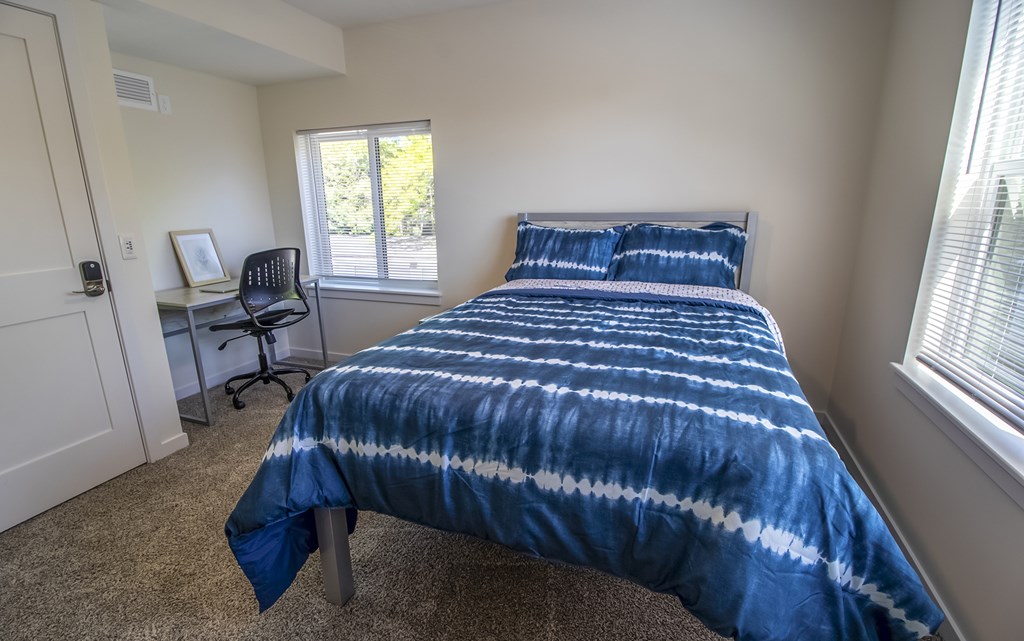 Furnished bedroom at Reserve, at Reserve Overlook Apartments, Integrity Realty, Ohio, 44106 Overlook Apartments, Cleveland Heights