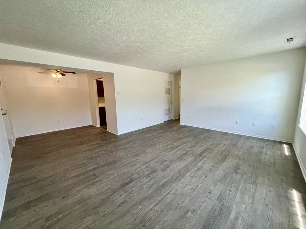an empty living room with wood floors and white walls at Renova of Brunswick, Brunswick, 44212 