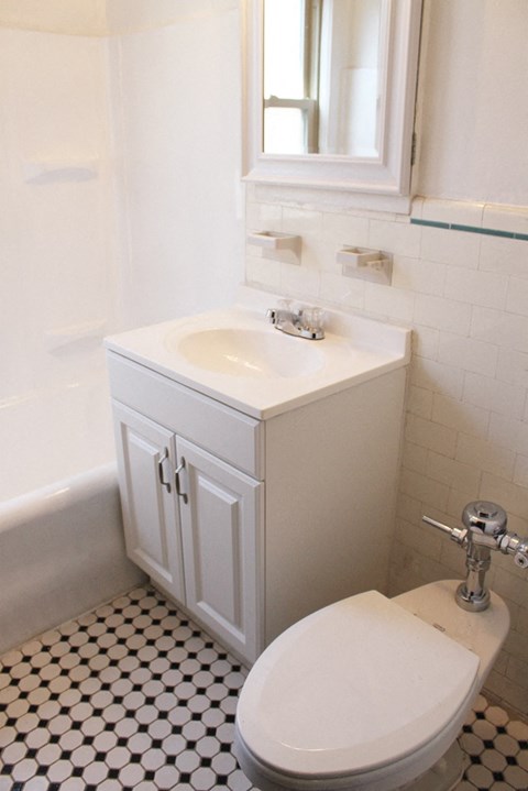 a small bathroom with a toilet and a sink