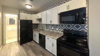 Open Renovated Kitchen at Jordan Court Apartments, Integrity Realty, Kent, OH