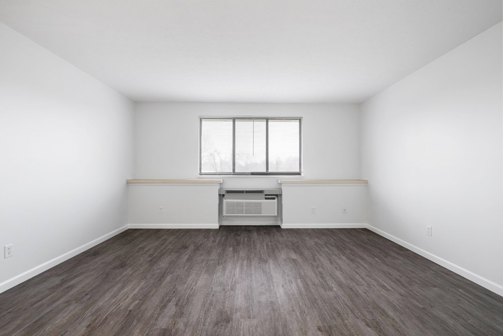 Alternate living room floor plan with plank-style flooring at Integrity Medina Apartments,  Ohio