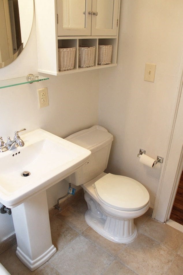 a bathroom with a toilet and a sink