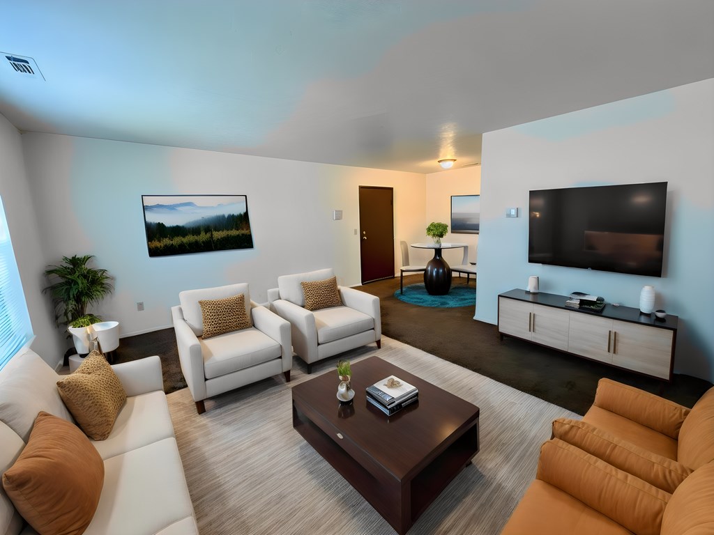 a living room with a couch and a coffee table and a television at Renova of Brunswick, Brunswick, OH 44212 