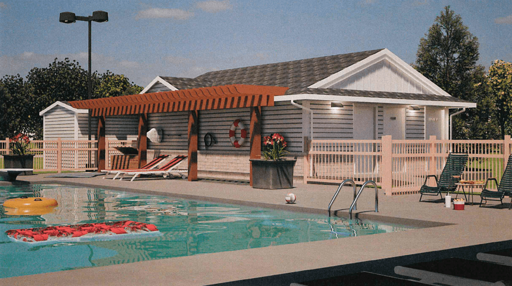 swimming pool and a deck with chairs at Renova of Brunswick, Brunswick 