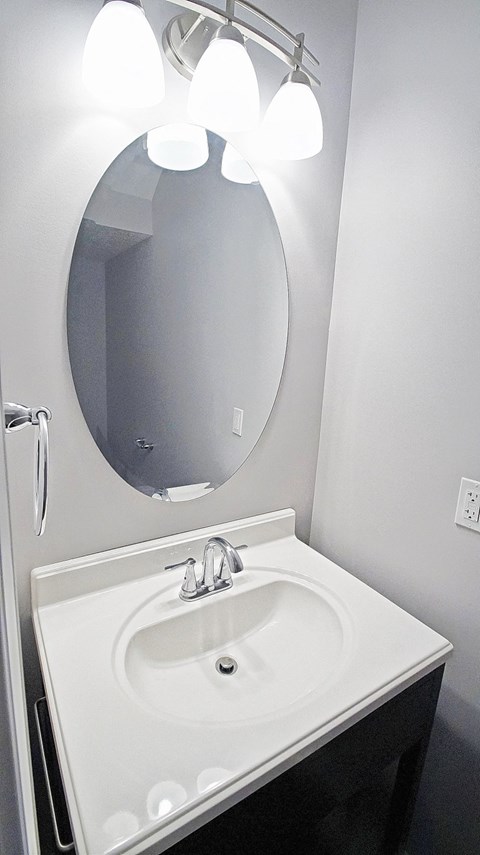 Master bathroom with floating vanities at The Reserves at 1150 Apartments, Integrity Realty LLC, Parma, 44134