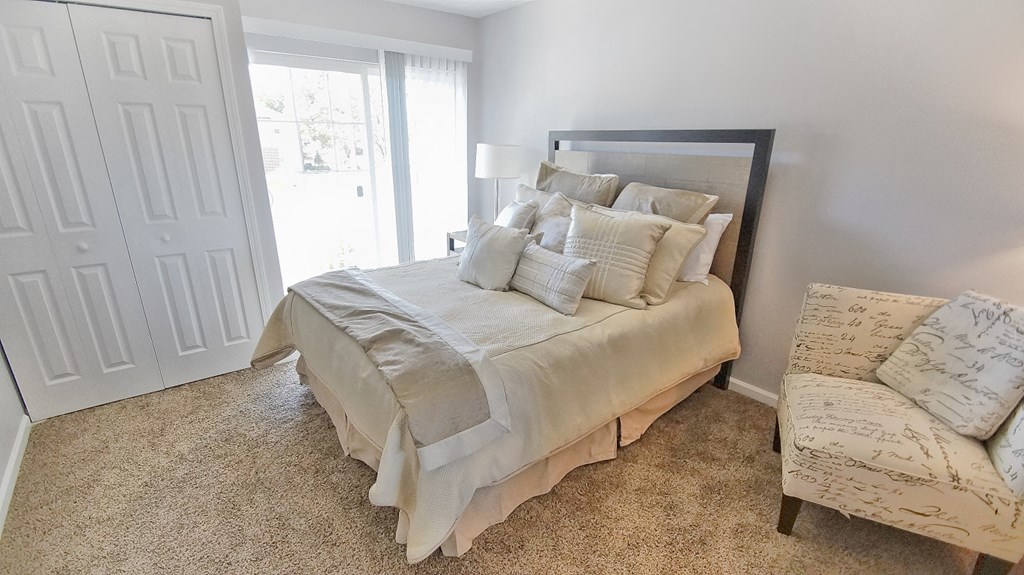 Bedroom With Expansive Windows at The Reserves at 1150 Apartments, Integrity Realty LLC, Parma, OH, 44134