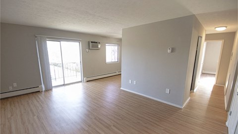 Updated living area with plank flooring