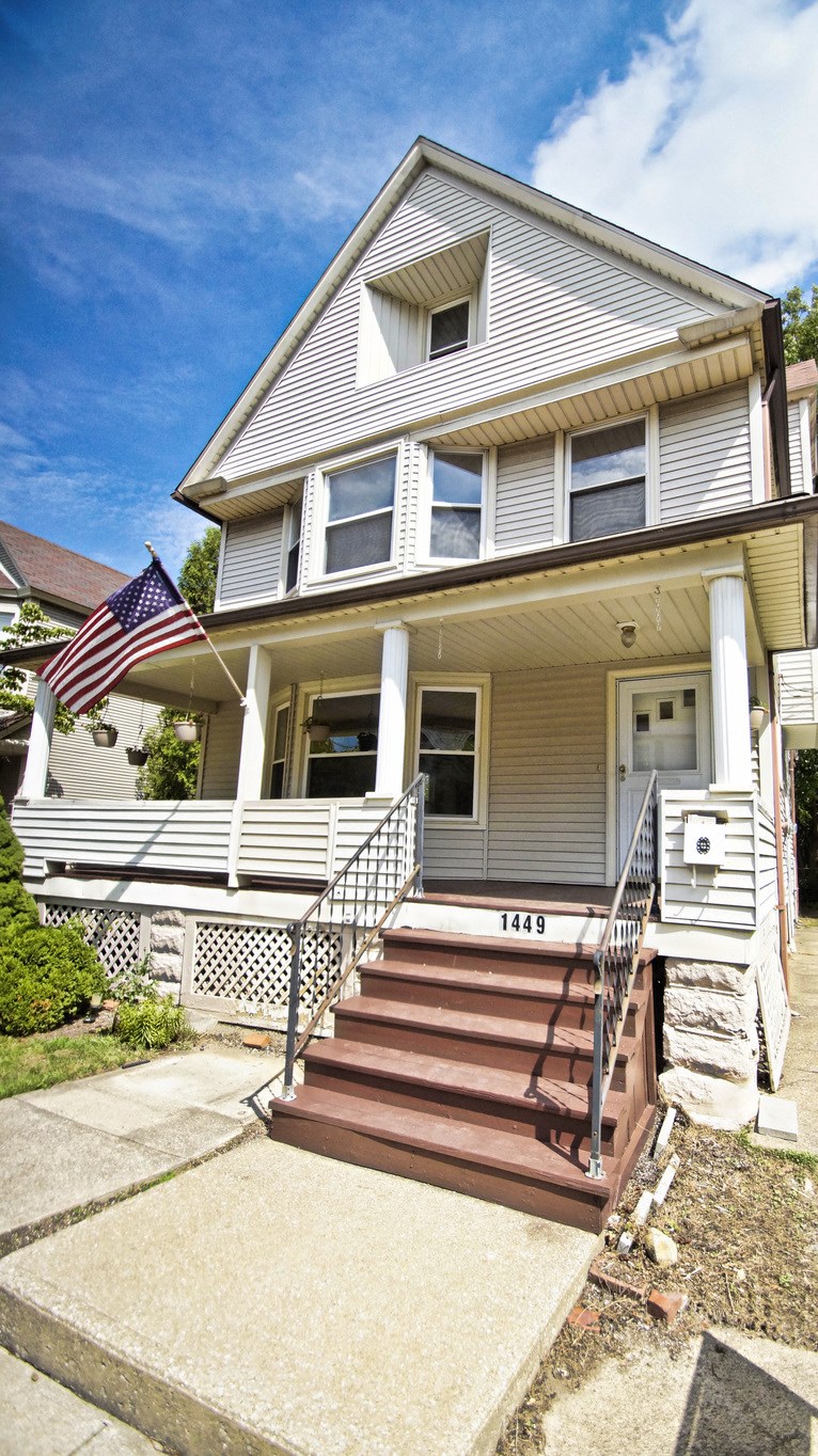 a house with an flag in front of it
