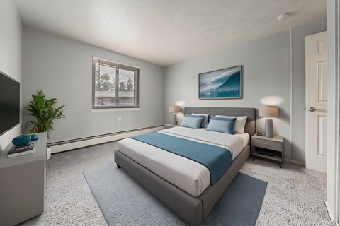 A bedroom with a large bed and a television. at Integrity Berea Apartments, Berea, 44017