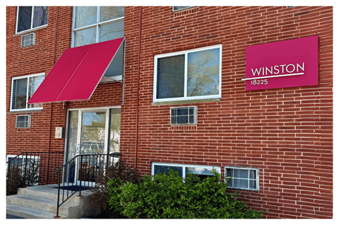 A red building with a sign that says Winston 18225.