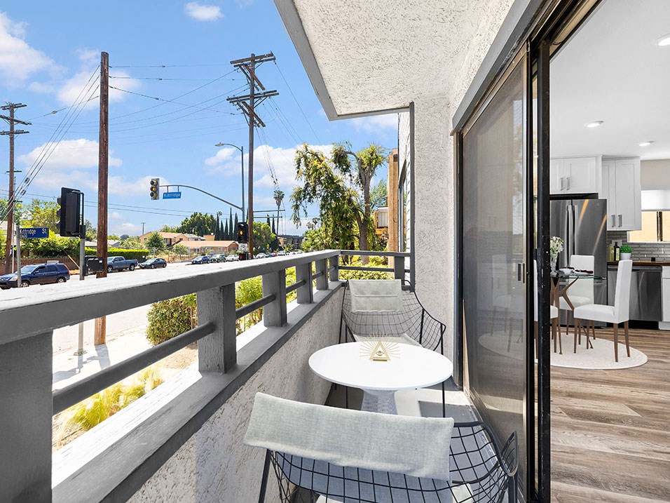 Private balcony overlooking Woodman Ave.