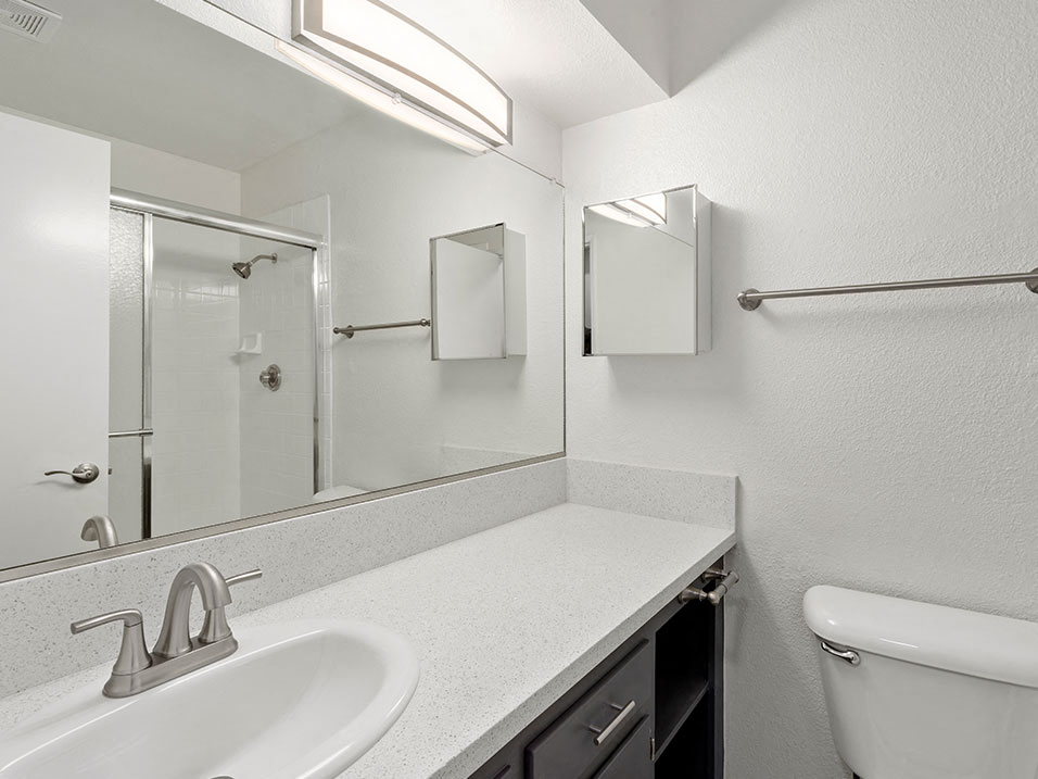 Modern styled bathroom with shower and tub.
