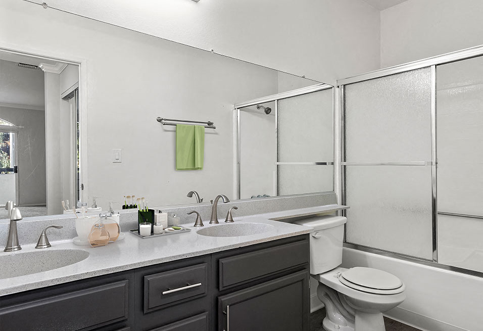 Modern styled bathroom with shower and tub.
