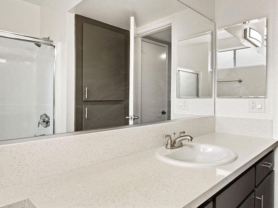Modern styled bathroom with shower and tub.