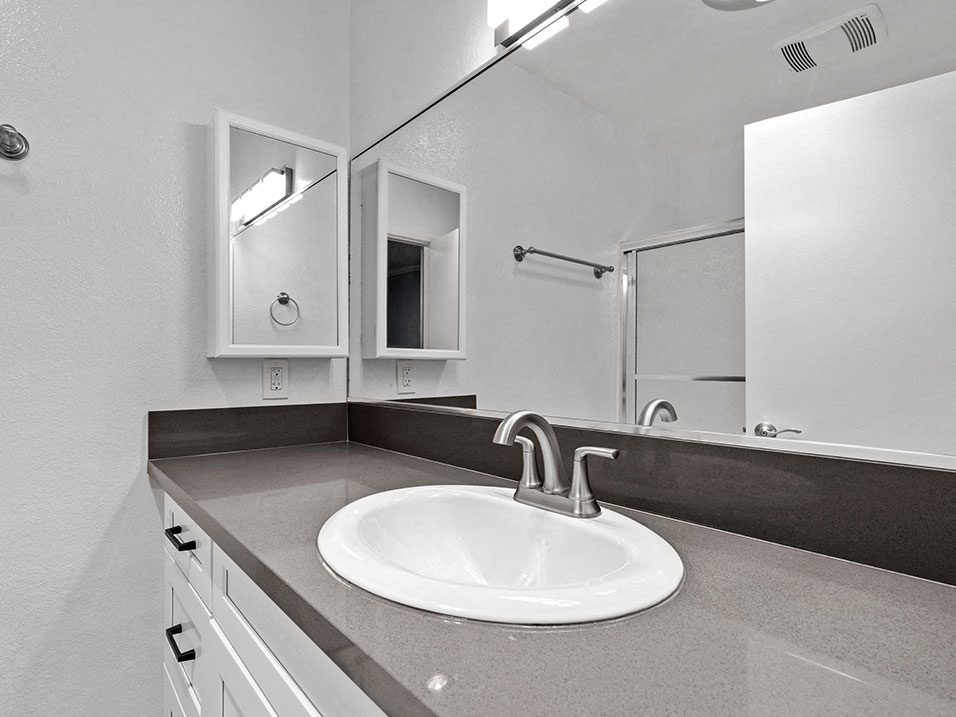 Modern styled bathroom with shower and tub.