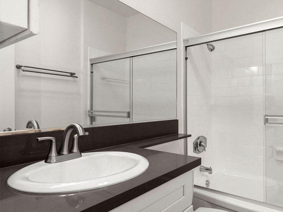 Modern styled bathroom with shower and tub.
