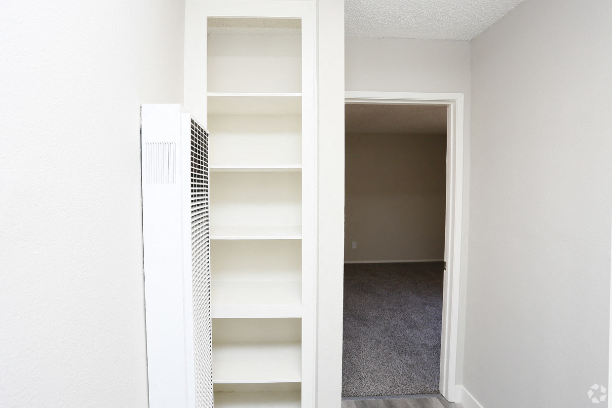 View of hallway linen storage closet.