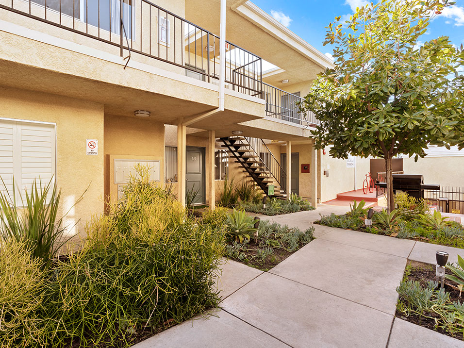 Drought resistant landscaping and barbeques in each courtyard.
