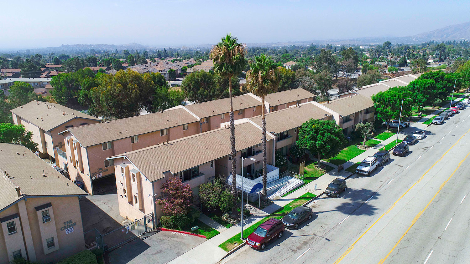 Aerial drone view of Olive View Gardens' five free-standing buildings..