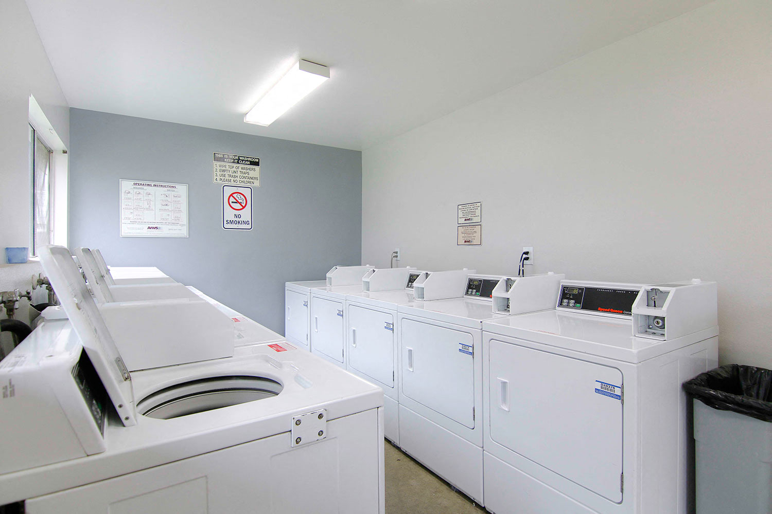 Community laundry room. Additionally, every individual private garage has their own washer and dryer hook up.