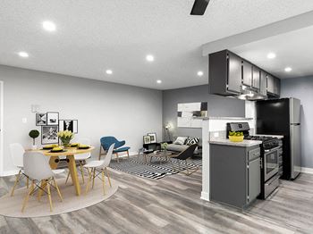 Hardwood floor living room and dining room with view of kitchen.
