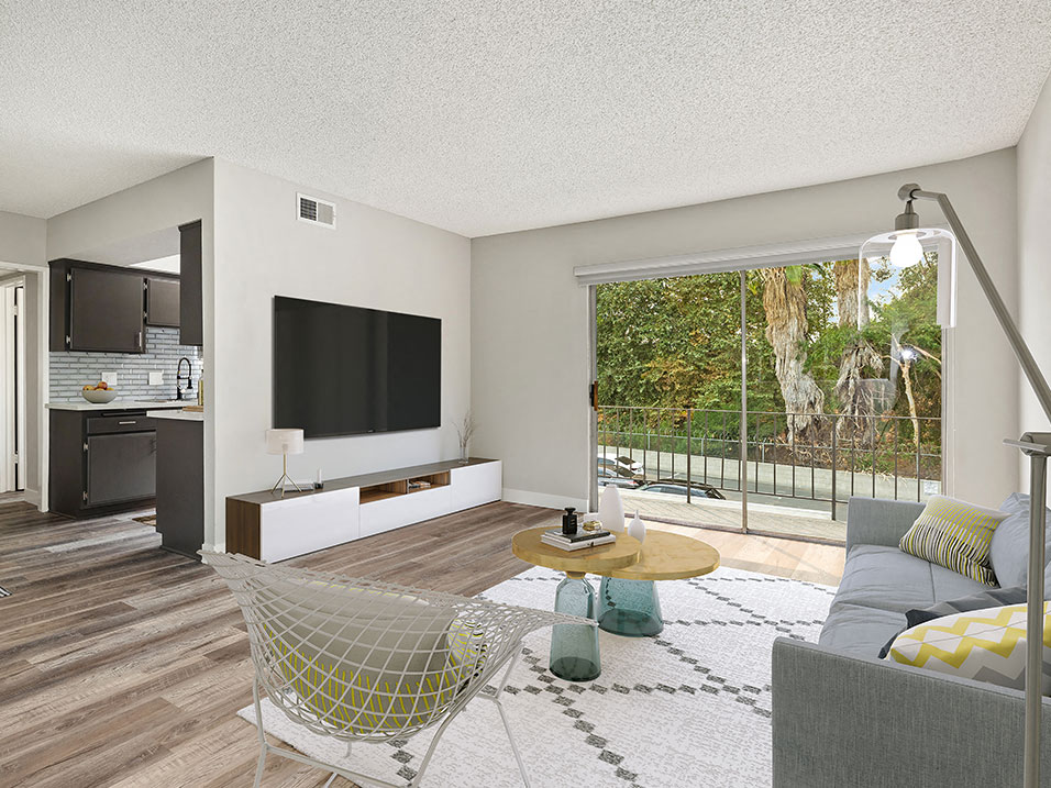 a living room with a couch and a television