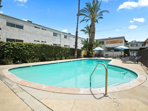 One of two large gated pools and lounging area.