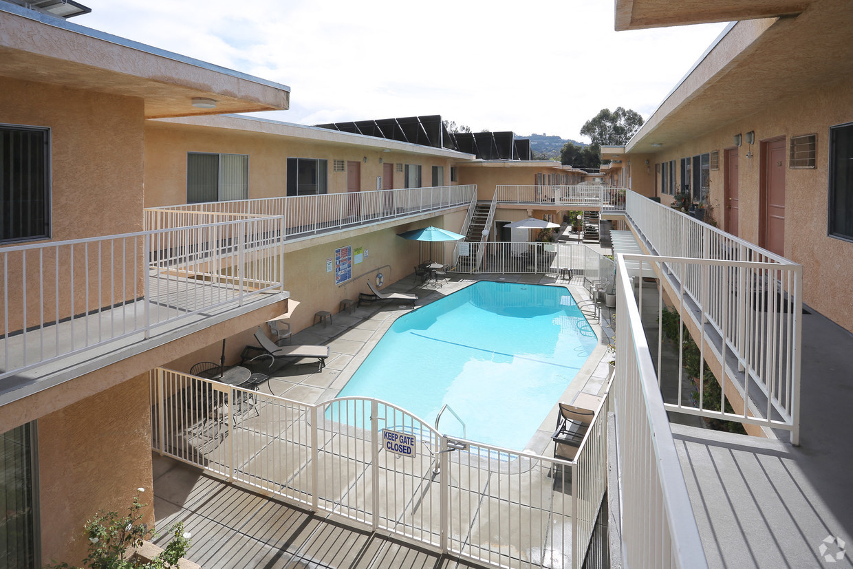 Second floor view of large solar heated pool  in Woodbridge Park courtyard.