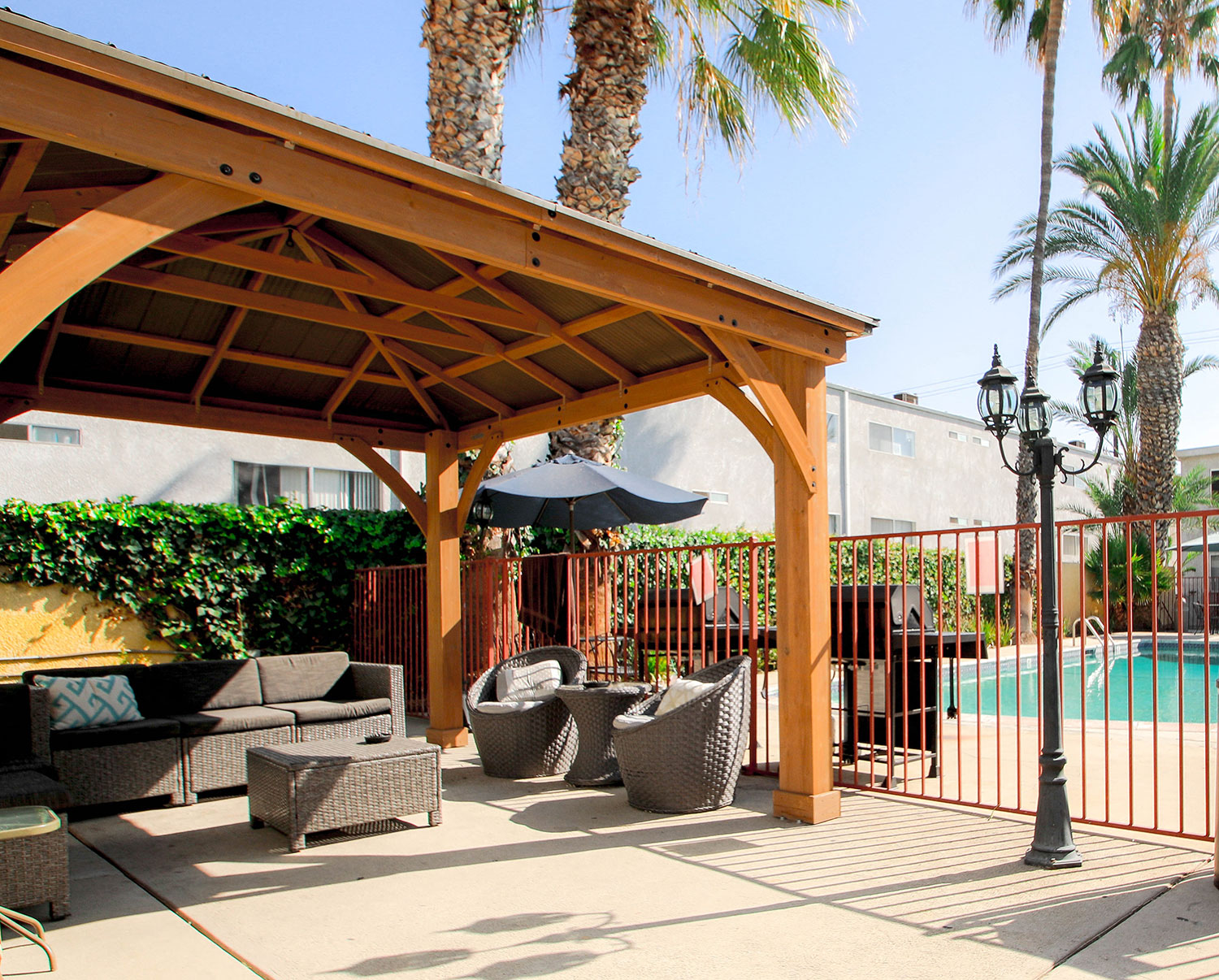 Gazebo and seating area by the pool.