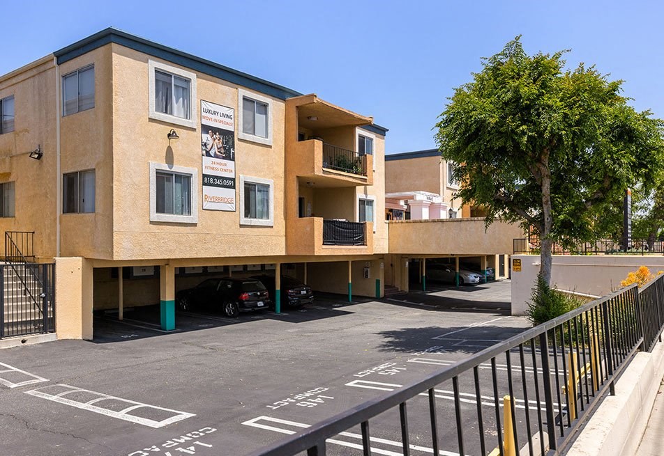 Tuck under and lot parking at each of five buildings.