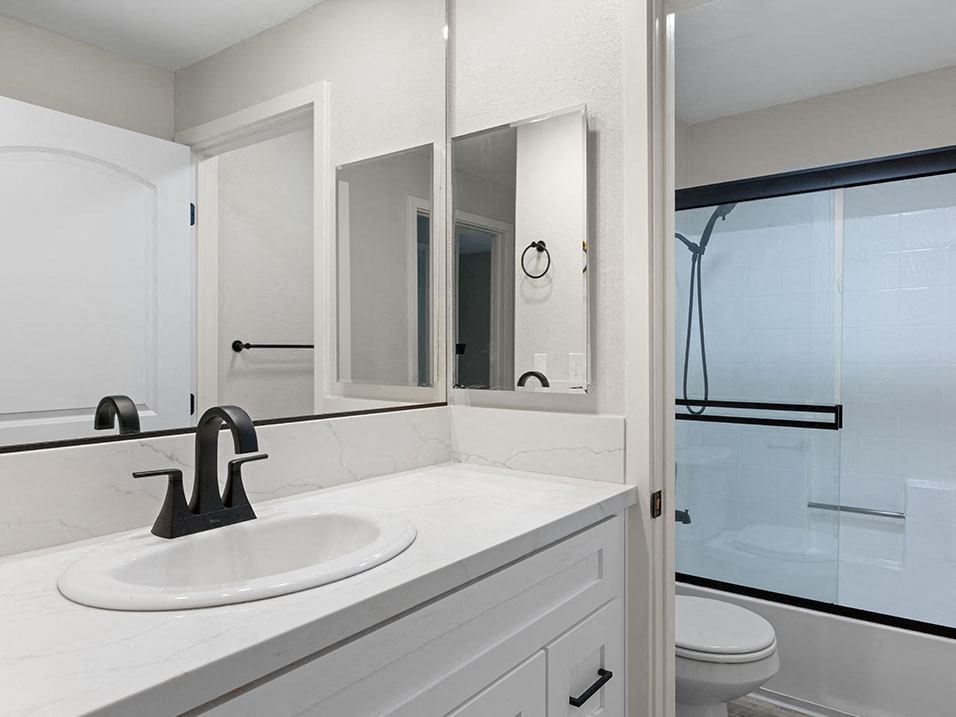 Modern styled bathroom with shower and tub.