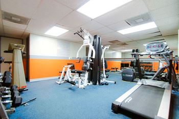 Fitness center with treadmills and weight equipment