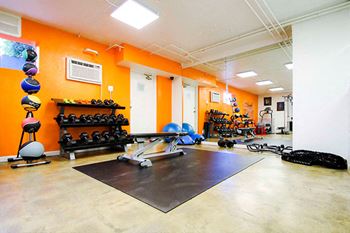Fitness center with treadmills and weight equipment