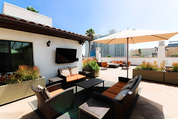 Dining area atop rooftop sundeck