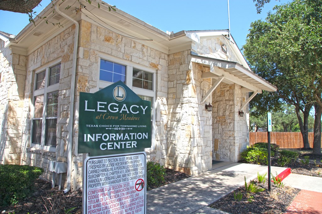 a building with a legacy information center sign in front of it